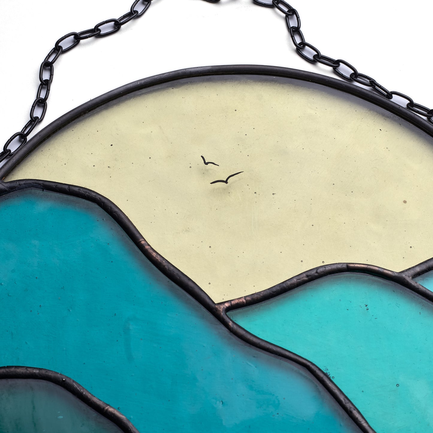 Emerald Horizons Lake Amidst Mountain Scenery Suncatcher